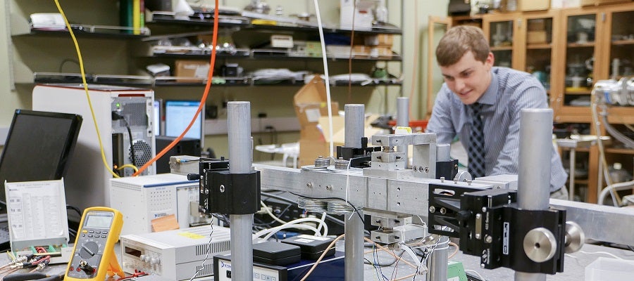 photo of an EAS student in a lab