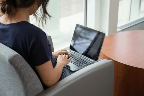 student working on a computer