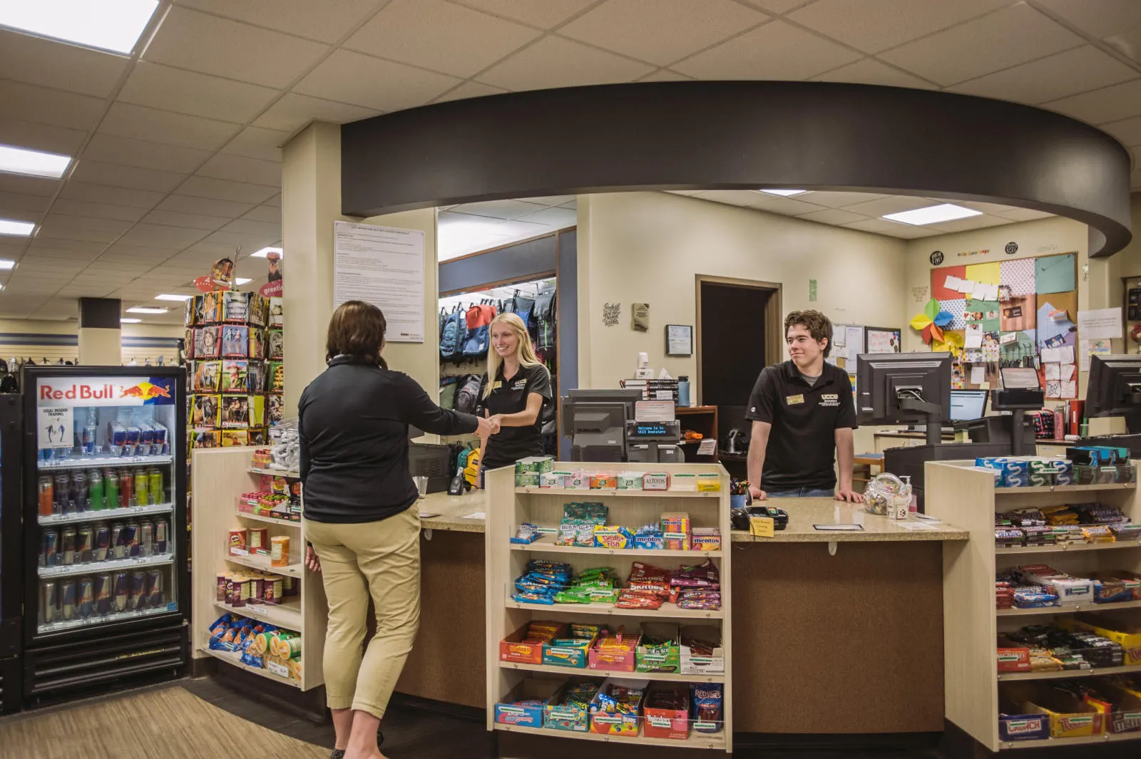 Students working at the bookstore